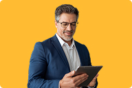 Professional man reviewing information on a digital tablet | Hemmat Law Group